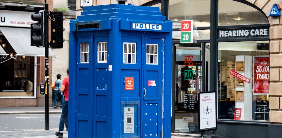 Police call box on a shopping street in the UK